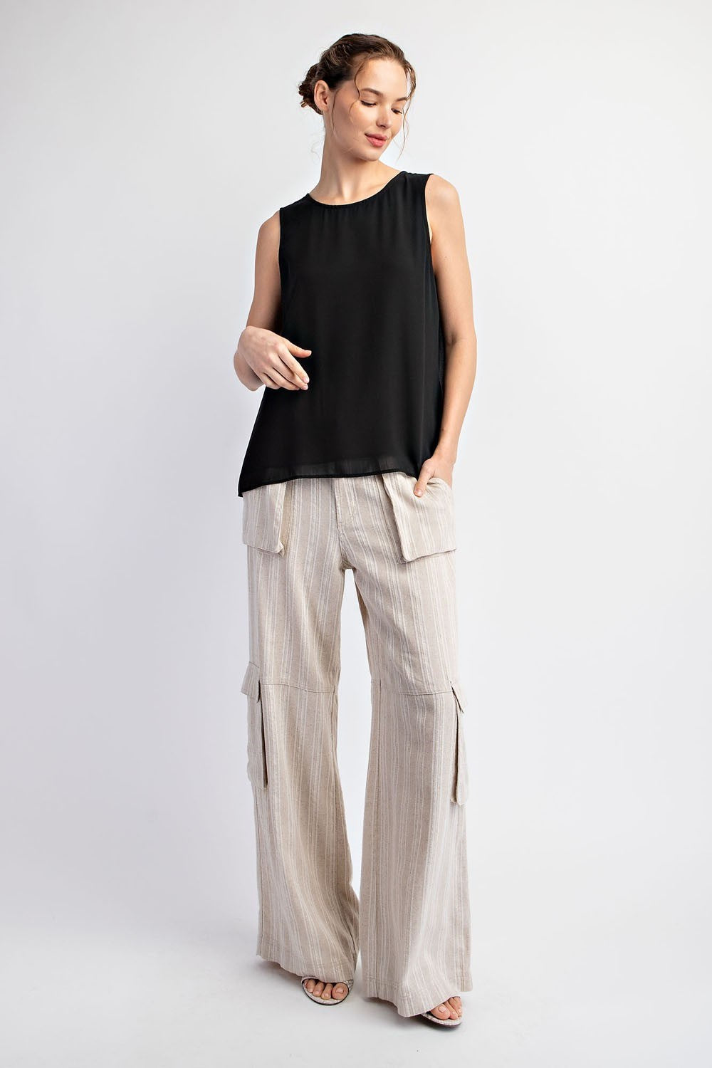 Sleeveless Blouse with Pleat details