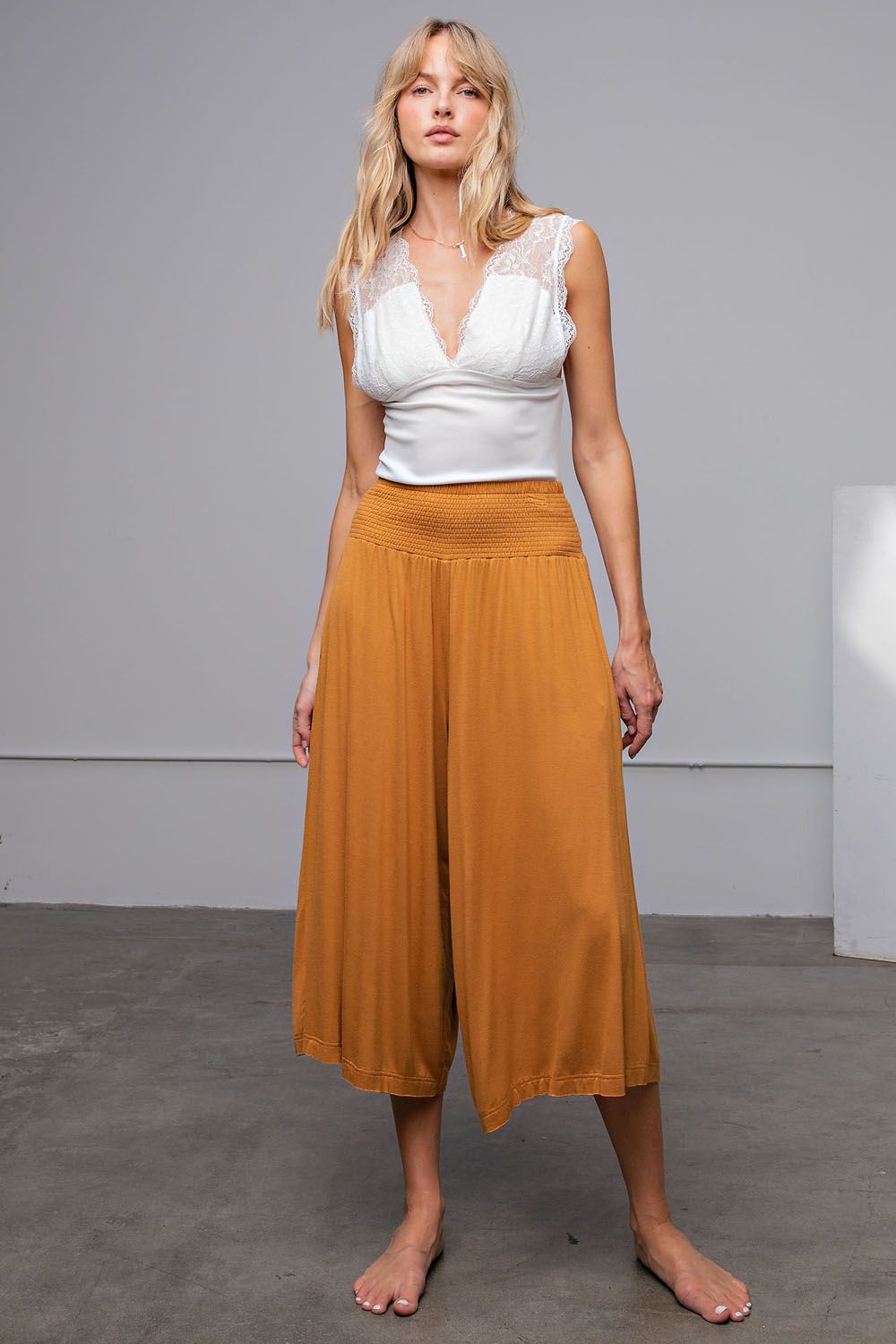 Smocked waistband crop pants in Camel