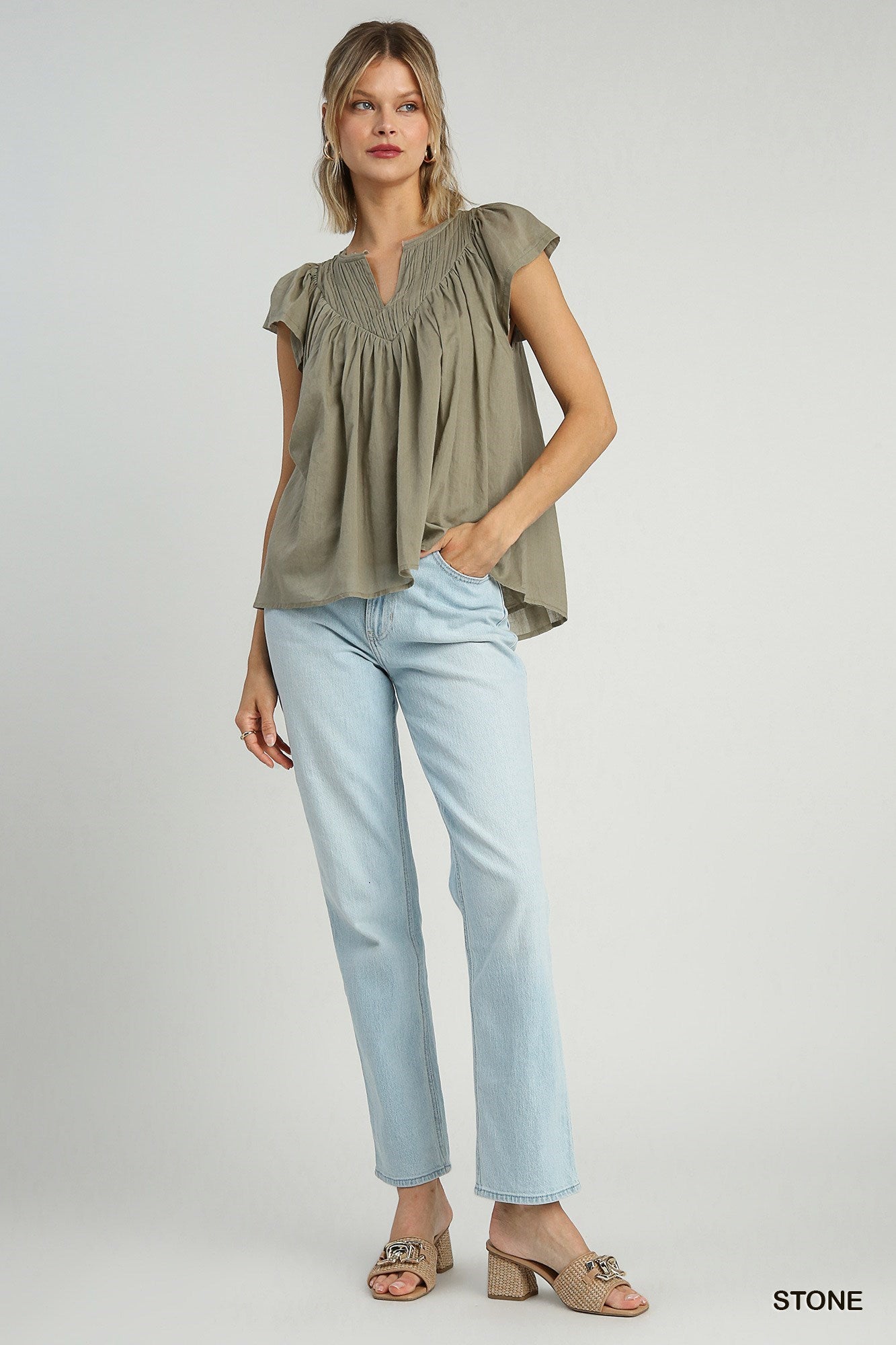 Pleated split neck blouse in Stone