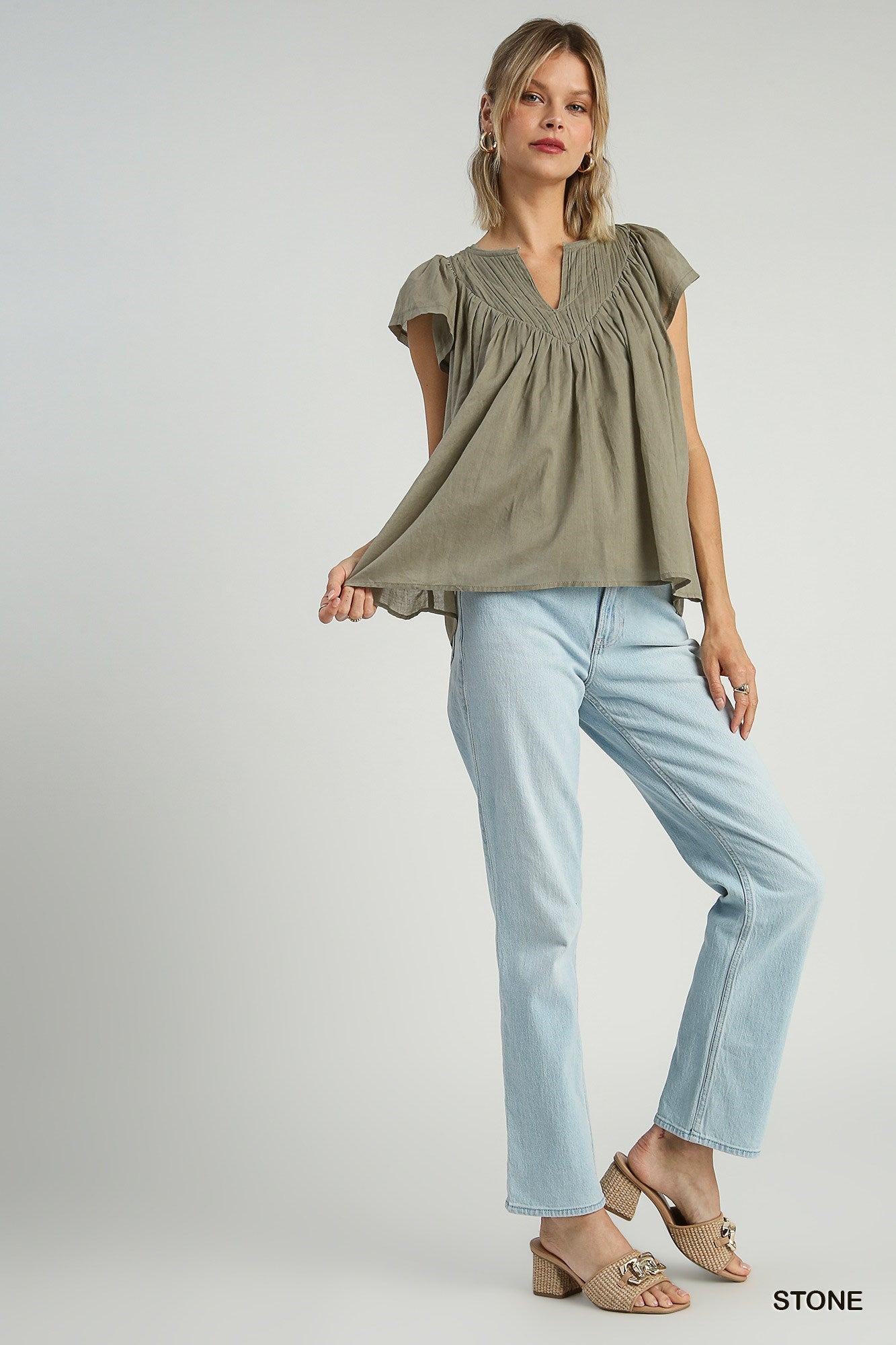 Pleated split neck blouse in Stone