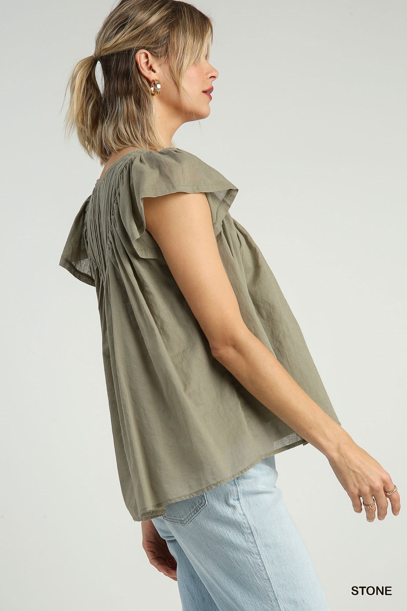 Pleated split neck blouse in Stone