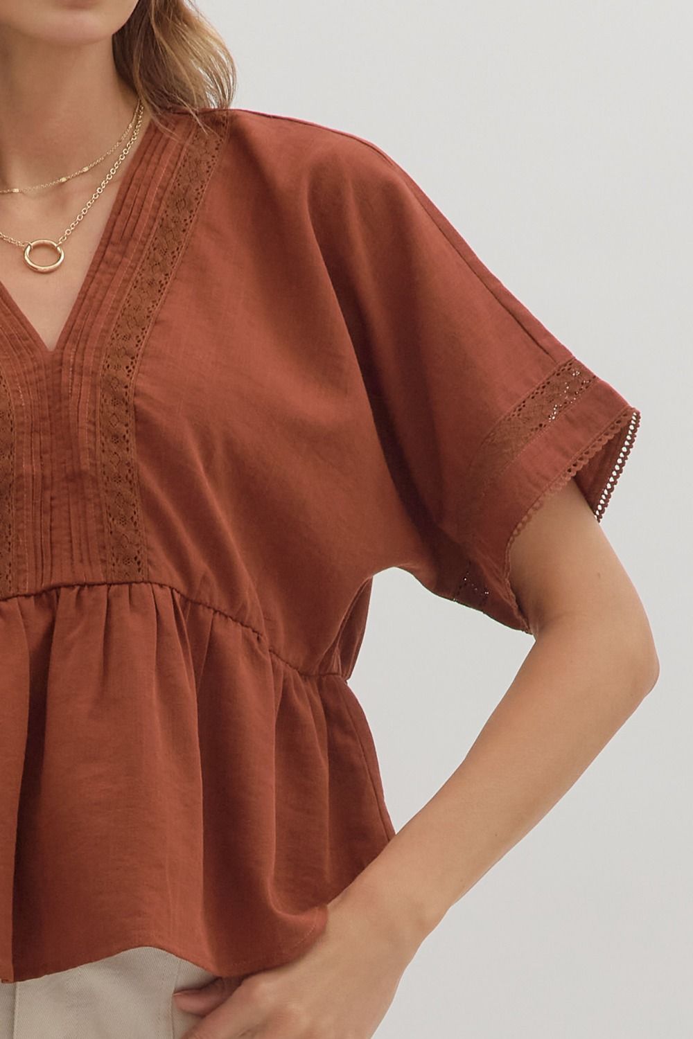 Pintuck Peplum Top in Terra Cotta